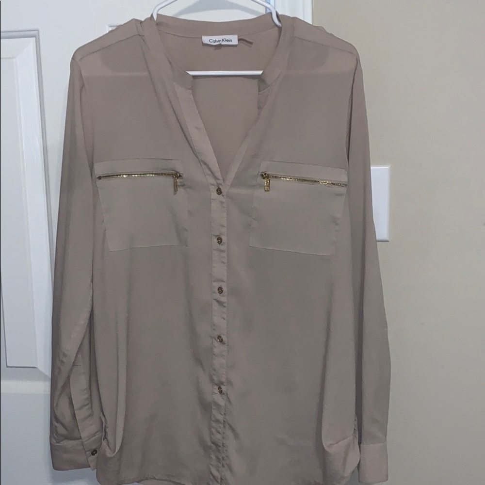 Tan shirt
